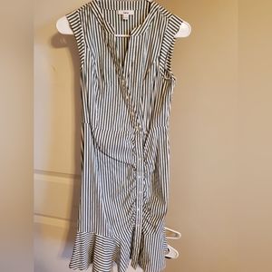 Green and white vertical striped button up dress. Form fitting. Very stretchy. S